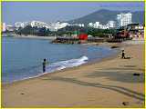 nice beach area; red oar sculpture in background