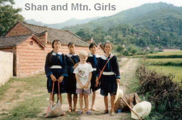 Shannon, our oldest son, with some minority girls in northern Guangdong province   Amoy Magic Guide to Xiamen and Fujian