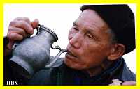 Changting Hakka sampling the local white lightning ( rice wine) 