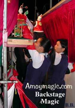 The real magic at a Zhangzhou hand puppet show is backstage, where the artists deftly weave magical spells with their little people. 