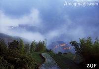 Etherial beauty of earthen roundhouses enveloped in morning mists
