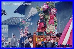 Children propped up on poles from morning to night, in annual Zougushi festival in West Fujian